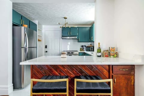 Everything You Need to Dine In: Families and groups will appreciate our fully stocked kitchen, complete with cookware, dishes, and high-end appliances. Perfect for home-cooked meals