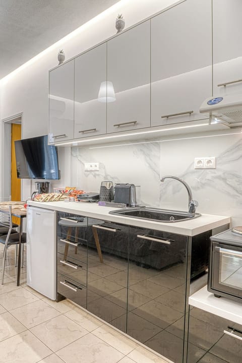 Mini-fridge, microwave, stovetop, electric kettle