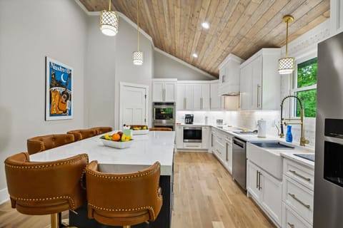 Full kitchen with all cooking essentials and island for additional seating (This is one of two kitchens in the home!)