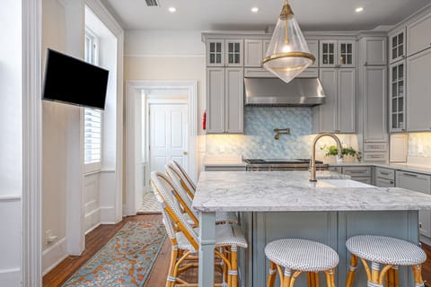 Whether you're joining together to prepare home-cooked meals, or planning your excursion for the day, the kitchen offers an ample amount of space.