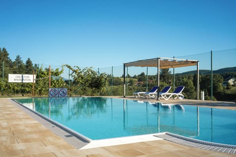Seasonal outdoor pool, open 10:00 AM to 8:00 PM, free cabanas