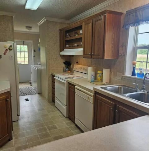 Laundry room is by the side door.