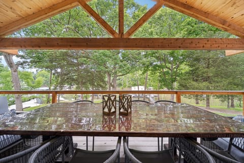 Covered outdoor deck w/ great view of lake