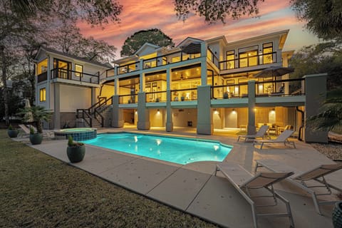 Discover a 5, 226 square feet of  oceanfront luxury in South Forest Beach at 9 Juniper Lane