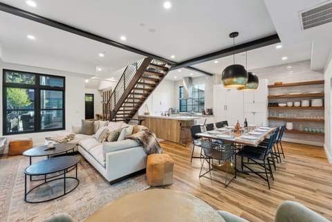 mid level living room, dining and kitchen