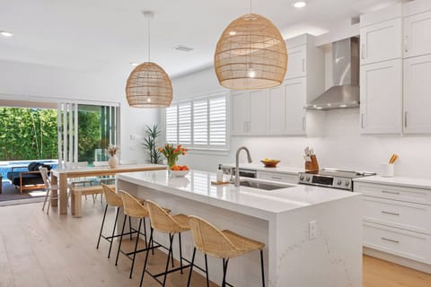 Quartz custom island and a chef's kitchen stocked with everything you can think!