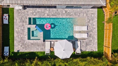 SOUTHERN FACING POOL MEANS LONGER SUNSHINE vs other homes. Enjoy the comfy turf!