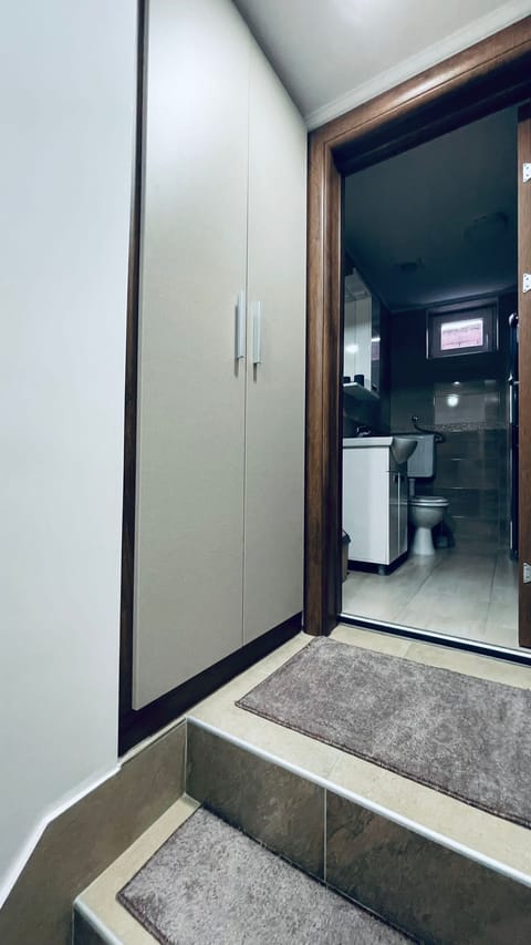 Quadruple Room | Bathroom | Shower, hair dryer, towels, soap