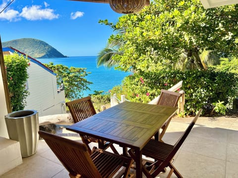 The terrace of Honoré Paradise Cottage. Caribbean Sea view.