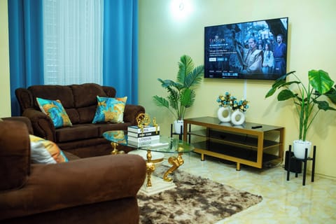 Our cozy living room features an A/C and  a 55'' smart TV for entertainment