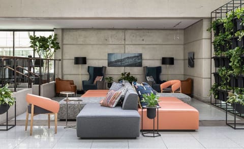 A spacious and well-lit lobby that offers the perfect mix of style and comfort.