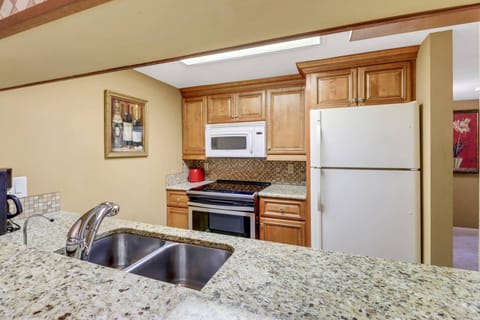 The kitchen is equipped with full size appliances, and all cookware, dinnerware and many kitchen tools.