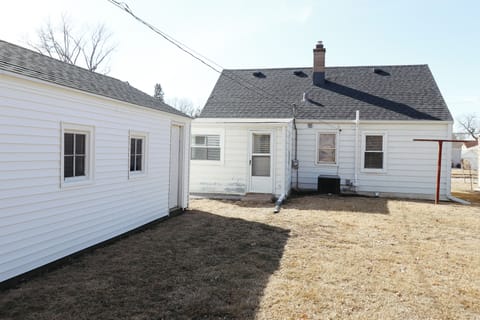 Backyard with garage. 