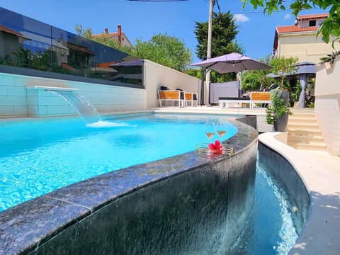 Apartment (Two Bedroom Apartment with Swimming P) | Pool | Outdoor pool, pool umbrellas, sun loungers