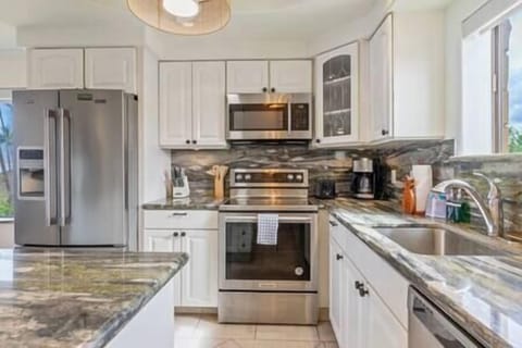 Updated kitchen with stainless appliances