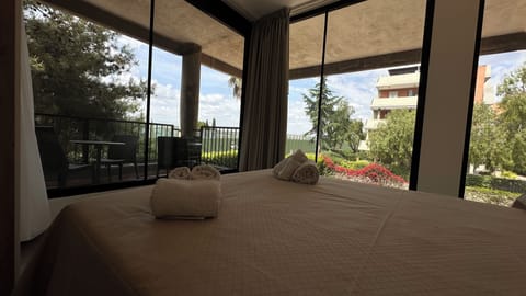 Deluxe Apartment, Garden View | 1 bedroom, individually furnished, desk, laptop workspace
