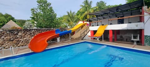 Outdoor pool, open 8:30 AM to midnight, pool umbrellas
