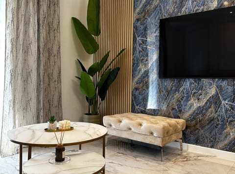 Apartment (Two Bedroom Apartment with Terrace an) | Living room | 32-inch flat-screen TV with digital channels