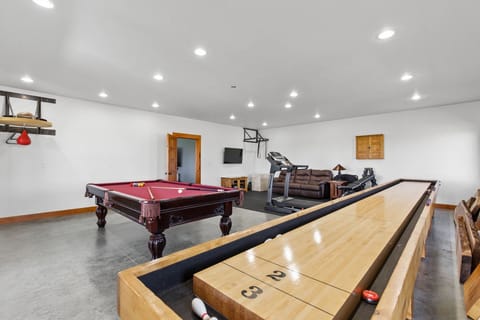 Full size Shuffleboard, Pool table, Foosball and workout space.