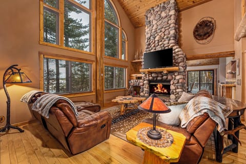 Living Area with Fireplace, Smart TV, Large Windows