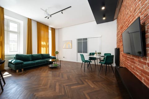 Comfortable Living Room with Sofa Bed and Smart TV | Book Now with RENTUJEMY