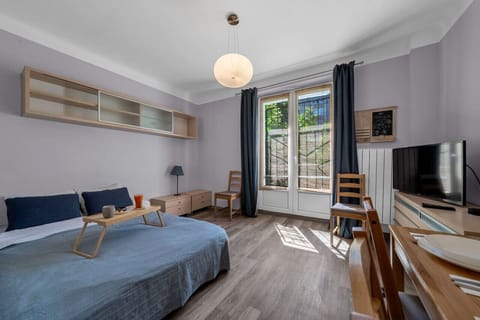 Comfortable Living Room with Sofa Bed and Smart TV | Book Now with RENTUJEMY