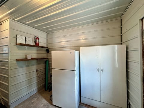 Garage has full-sized fridge/freezer for ice, beverages & more!