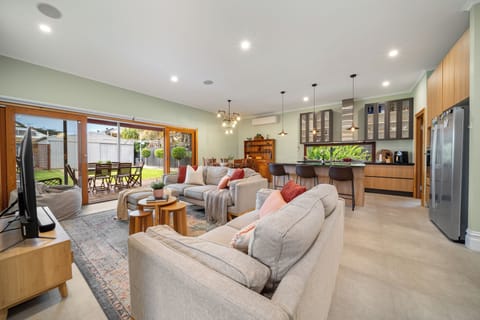 Large living area suitable for entertaining guests or relaxing with family.