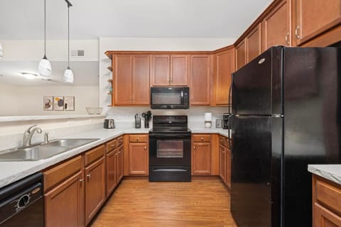 Cook up something special in this fully equipped kitchen, featuring everything you need for a home-cooked meal.