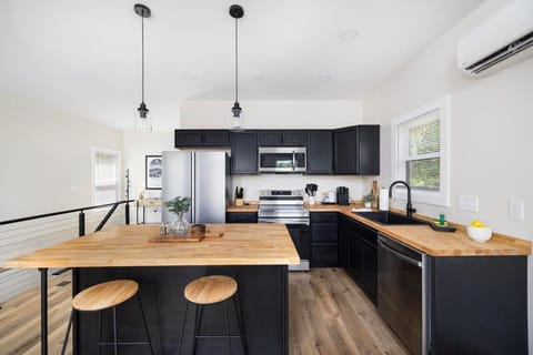 A modern kitchen ready for cooking meals or reheating leftovers.