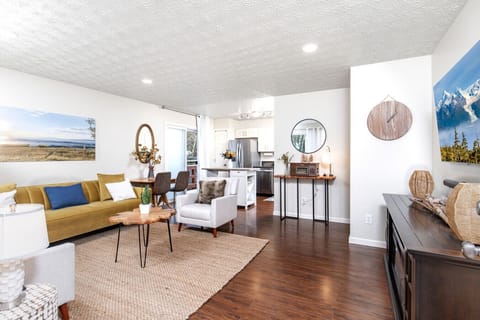 Bright, inviting living space with fireplace - perfect for unwinding