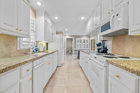 The bright, modern kitchen, granite countertops and all appliances!