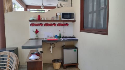 Basic Studio, Patio, Garden View | Private kitchen | Mini-fridge, microwave, blender, cookware/dishes/utensils