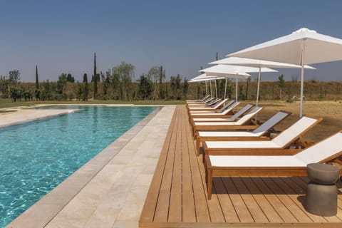 Seasonal outdoor pool, pool umbrellas, sun loungers