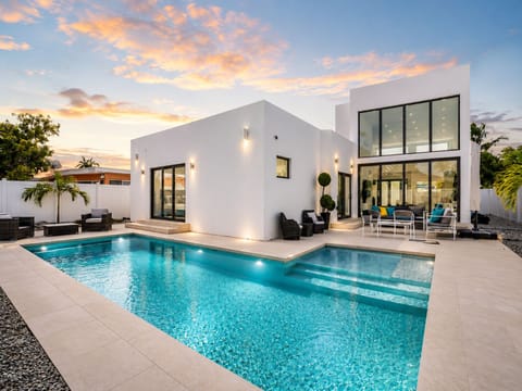 Luxury Modern Retreat Near Miami Beach  Escape to this stunning, modern luxury home located in one of Miami's safest and most peaceful family-friendly neighborhoods. Just 5 minutes from Miami's world-famous beaches,