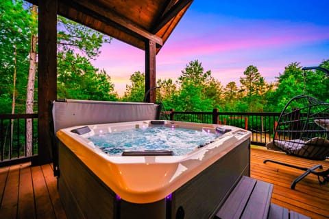 Relax and unwind in the soothing hot tub