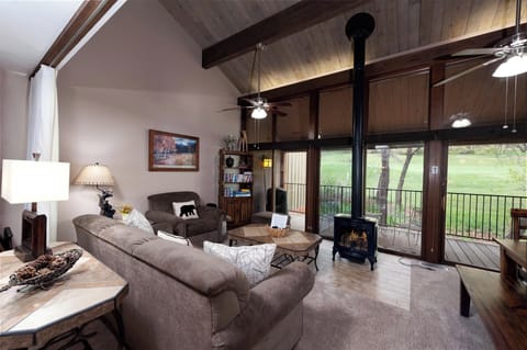 Living Room with Sleeper Sofa, Fireplace and Large Deck
