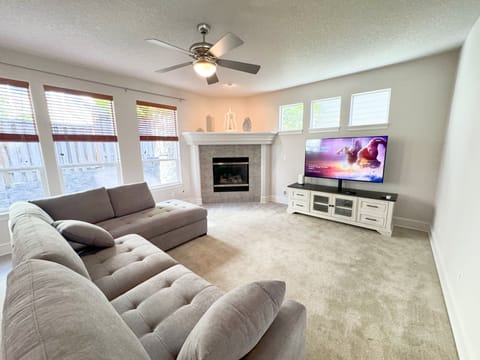 Enjoy your favorite shows while relaxing beside the warm fireplace.