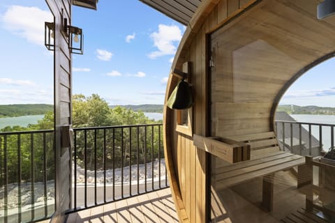 Main Level: Outdoor sauna accommodating 6 w/ lake view