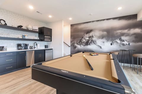 Lower-level game room is ready for your billiards competition