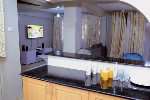 Deluxe Apartment, City View | Private kitchen | Fridge, microwave, cookware/dishes/utensils