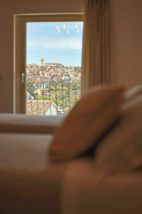 Exclusive Quadruple Room, Pool View | City view