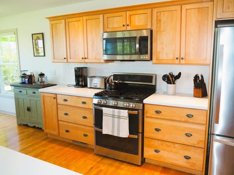 KITCHEN:  The home has an excellent kitchen will all appliances (including a dishwasher) and a good supply of cooking and dining utensils.