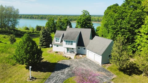 OVERALL:  Aerial photo of the home with pristine Long Lake in the background.