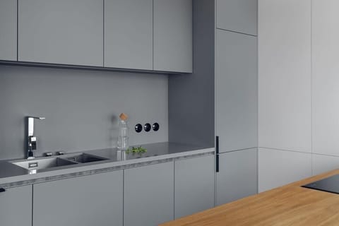 The kitchenette's practical layout maximizes space and functionality.
