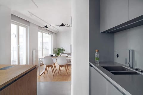 Cook and dine in style with the modern kitchenette and dining area.