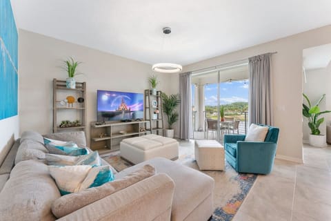 Living room with lake view #Disney #Parks #kingdom #springs #StoreyLake #resort #Apartment #Vacation #Rental #waterpark #Kissimmee #Orlando #universal #citywalk