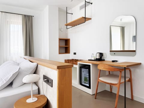 Deluxe Room | Premium bedding, minibar, desk, laptop workspace