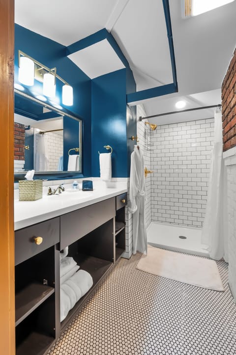 Standard Room, 2 Queen Beds, Non Smoking | Bathroom | Hair dryer, towels, soap, shampoo