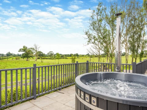 Hot tub | Whitehill Lodge - Whitehill Farm, Walton, near Brampton